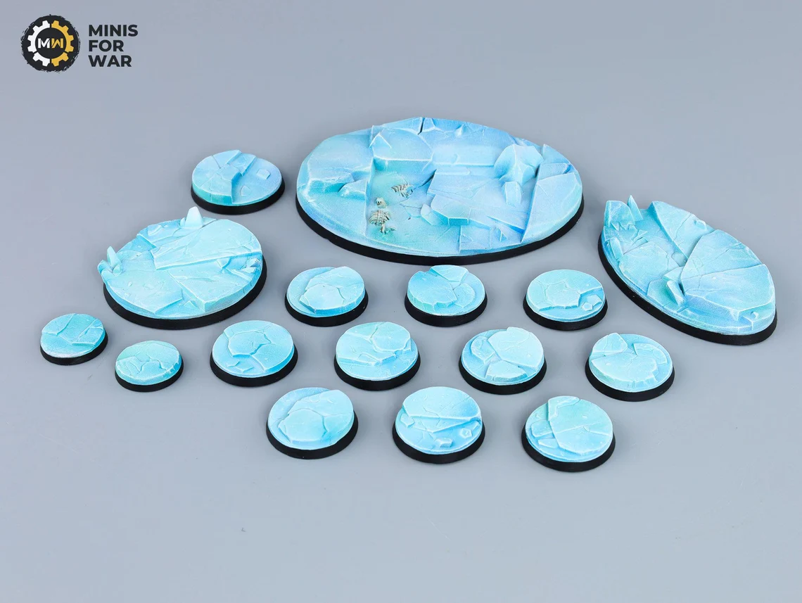 Frozen planet miniature bases with bright blue icy surfaces and clean fracture lines