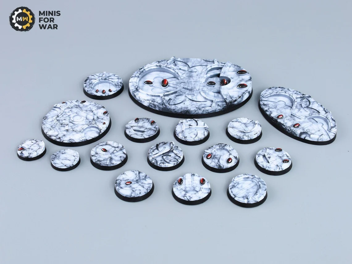 Miniature bases with marble textures and red gem-like stones