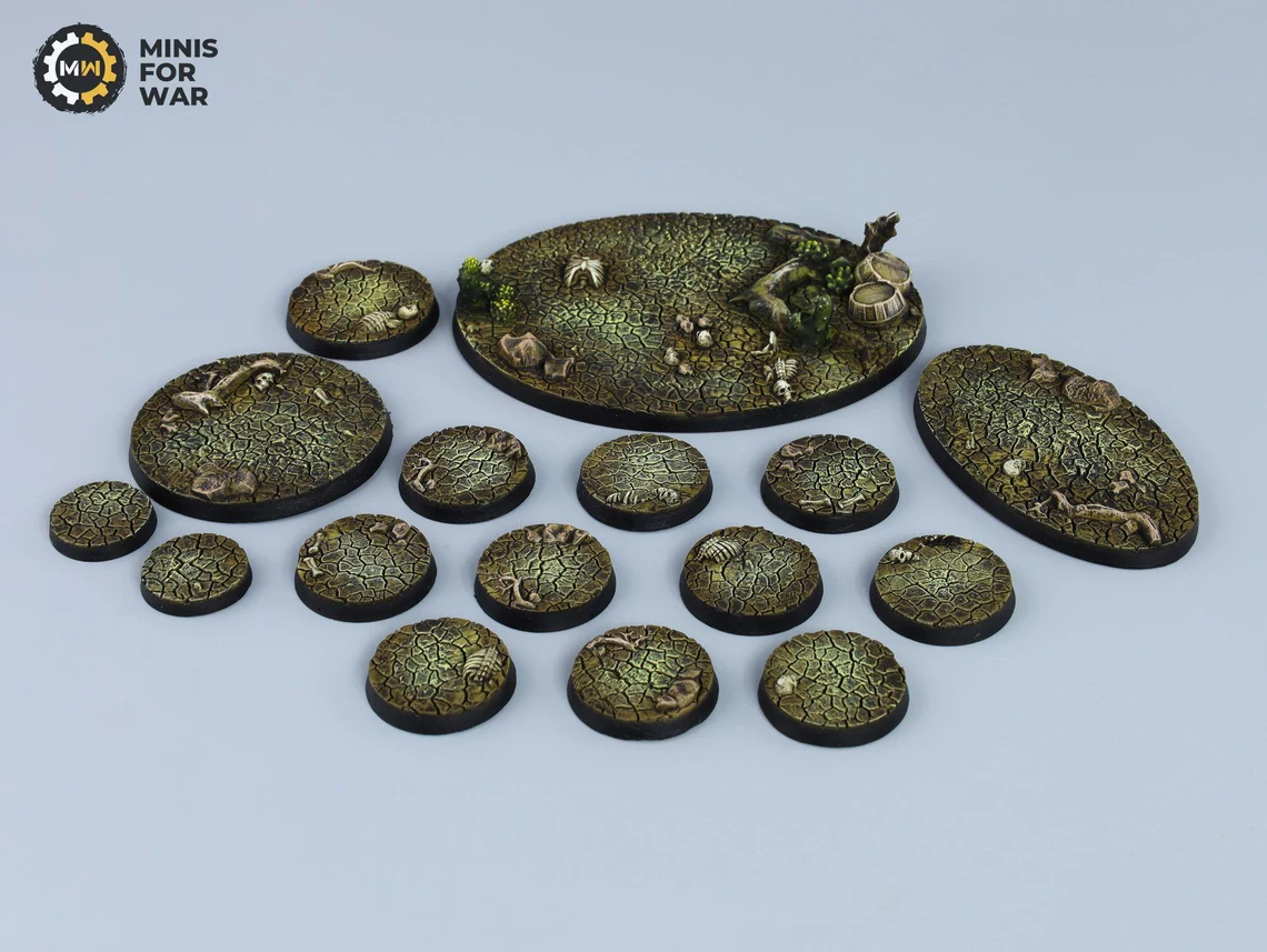Dry cracked terrain miniature bases with skeleton fragments and desert tones